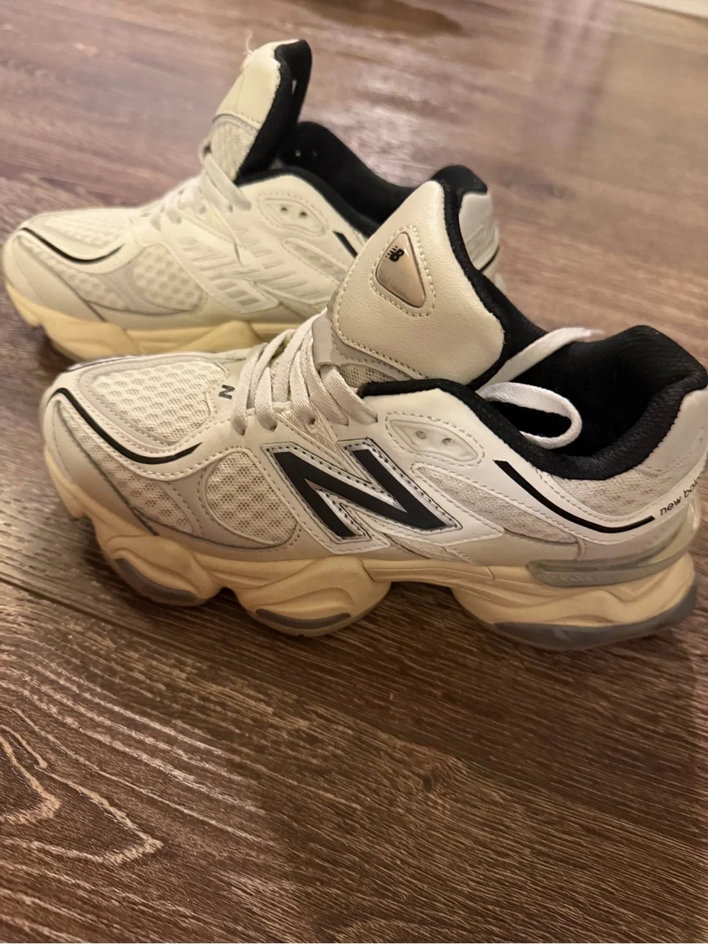 New Balance Cream White and Black Athletic Sneakers